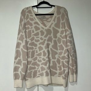 NWT/Never worn white and cream/tan giraffe print sweater.